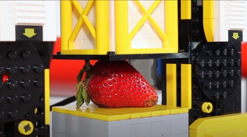 Brick-built LEGO mechanical press finally gets some revenge