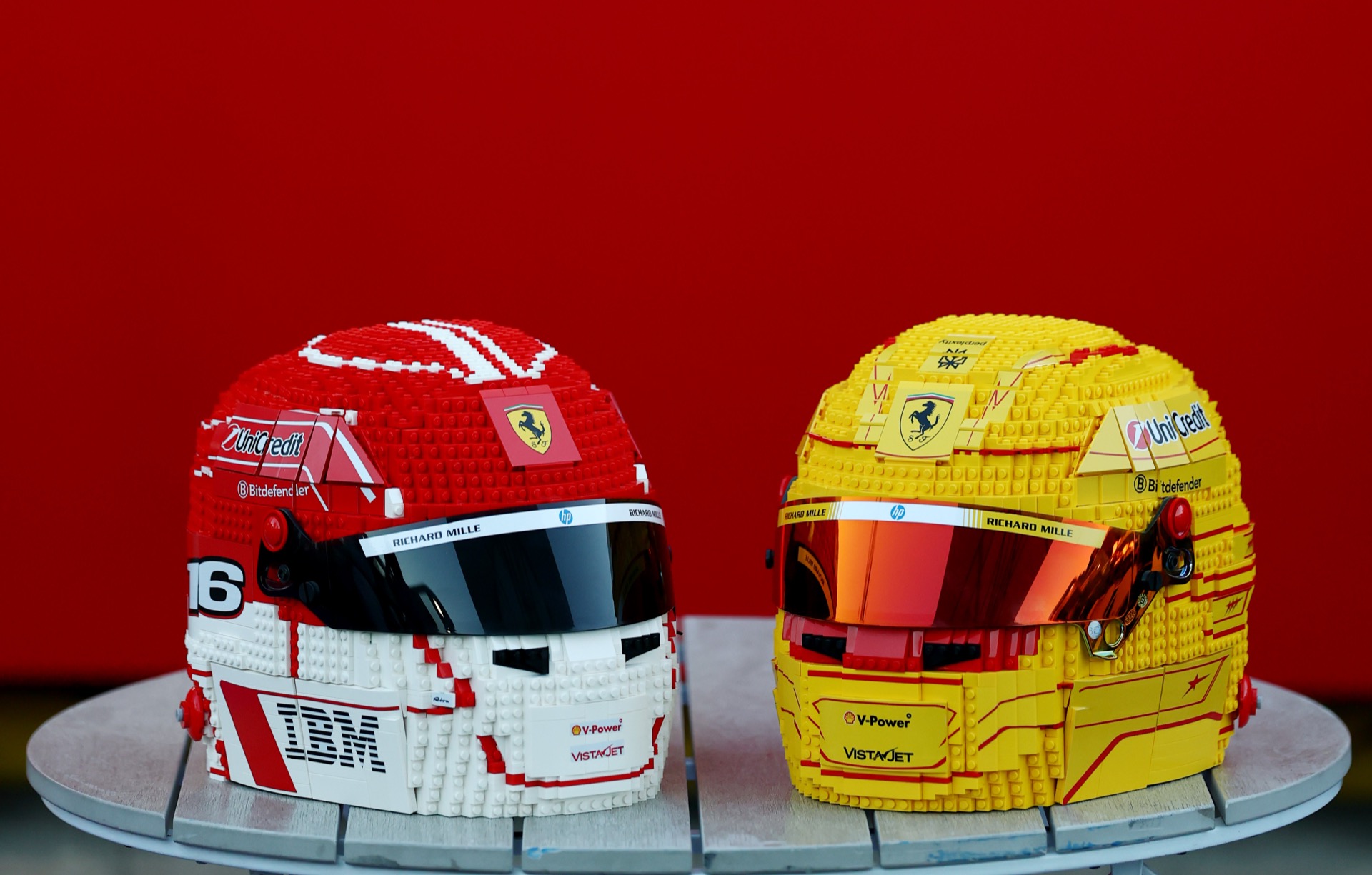 Ferrari Formula 1 drivers show off life-sized LEGO helmets